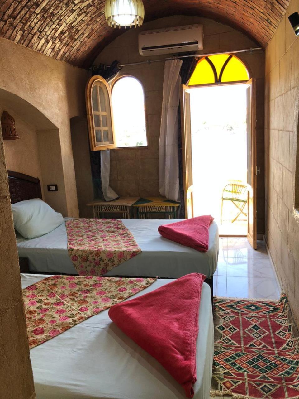 Queen House Assouan Chambre photo
