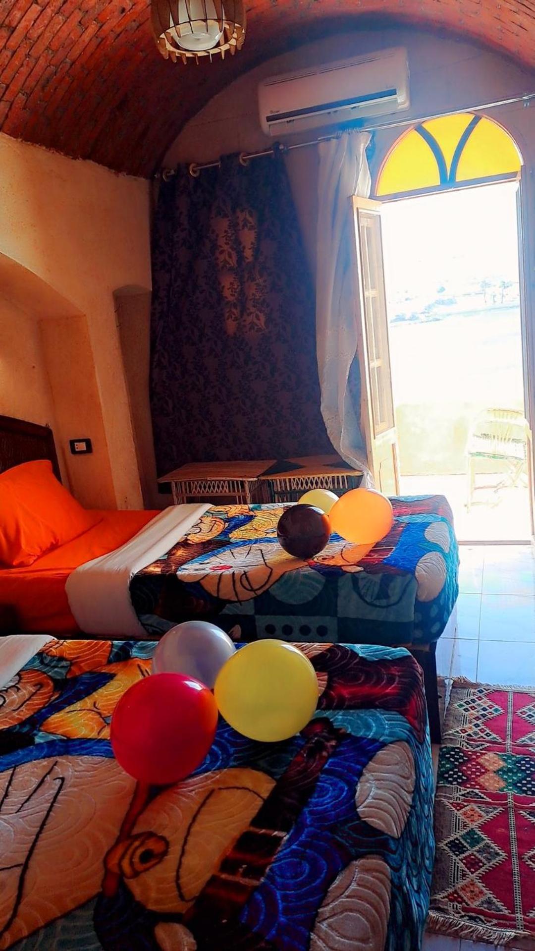 Queen House Assouan Chambre photo